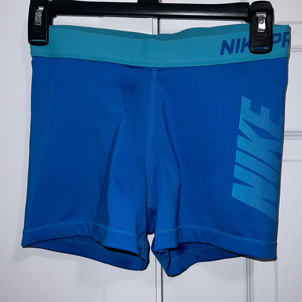Blue Nike Pro shorts